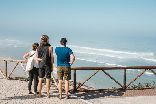 Surfers checking weather conditions 