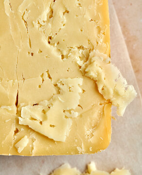 Closeup of a block of  artisan cheese