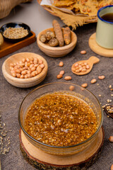 Rempeyek or peyek kacang is a deep-fried savoury Indonesian-Javanese cracker made from flour (usually rice flour) with peanut, lime leaves and other ingredients, bound or coated by crispy flour batter