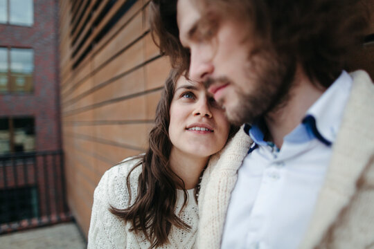 Portrait of young happy loving couple on the walk.