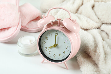 Female sleep routine accessories on white background