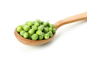 Spoon with pea seeds isolated on white background