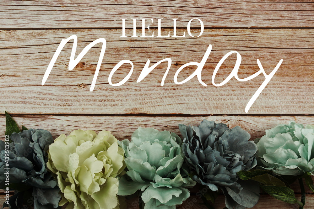 Poster Hello Monday typography text with blue flowers bouquet on wooden background