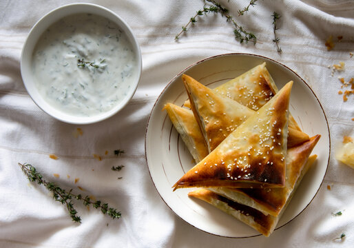 Greek spanakopita with Tzatziki dip