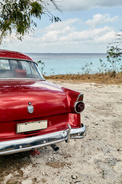 Old fashioned car on beach