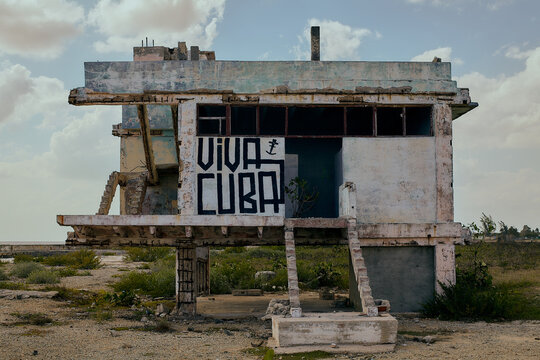 Abandoned building with shabby walls in nature