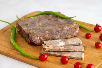 Turkish roasted meat ( kavurma ) on wooden floor.
