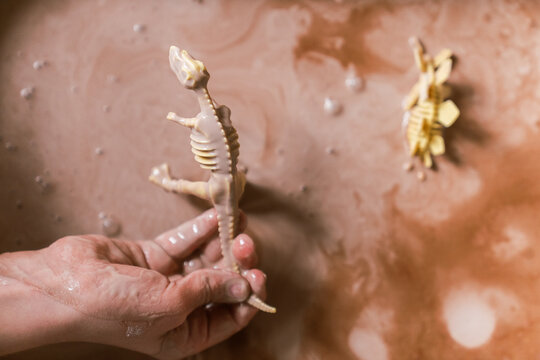 dinosaur play in muddy oobleck 