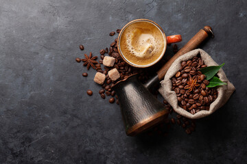 Coffee beans, Turkish jezve, coffee cup and sugar