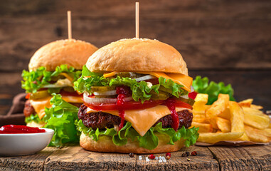 Burgers close-up on a brown background. Fast food.
