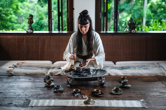 The Tea Master Conducts A Tea Ceremony