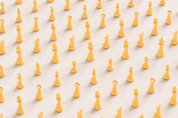 a pattern of yellow pieces of the chess game - 3d render