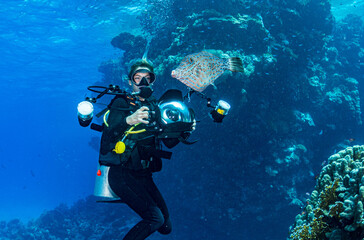Underwater Photographer and Fish