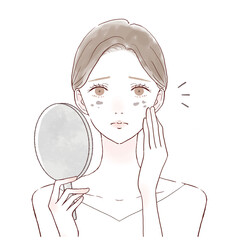 顔のシミに悩む女性