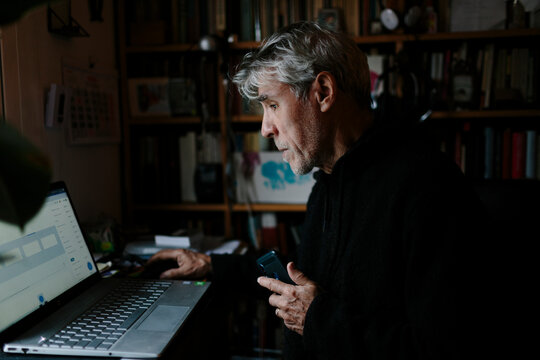 Man on computer at home