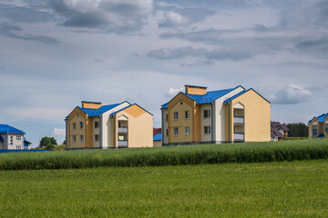 rows of colorful houses in a modern village
