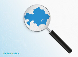 Magnifier with map of Kazakhstan on abstract topographic background.