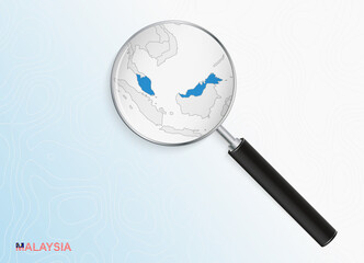 Magnifier with map of Malaysia on abstract topographic background.