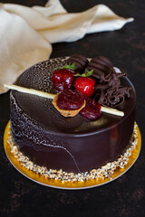 Chocolate cake on dark background