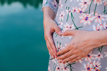 woman holding her belly.