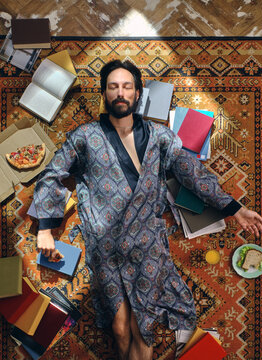 A man is engaged in self-development at home