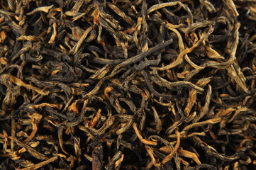 red chinese dian hun tea. Texture background macro photo.
