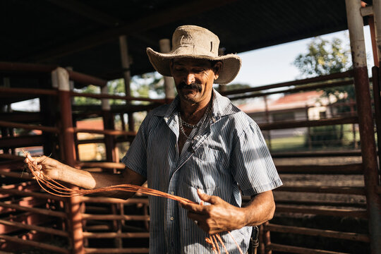 Farmer Working in the Stable