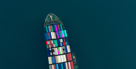 Aerial top view of the Logistics import export with container ship full load container which shipping or transportation concept background.