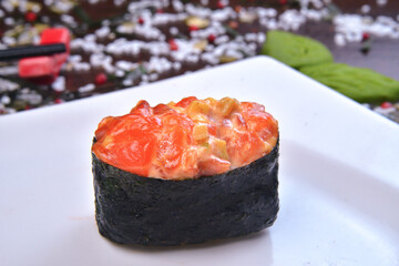 Spicy gunkan maki sushi with isolated on white background side view