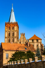 Fototapeta na wymiar Medieval tower of the Gothic Church of the Assumption of the Blessed Virgin Mary in Chelmno, Poland