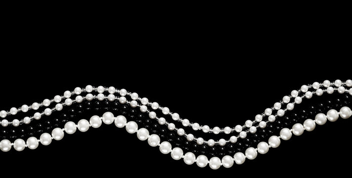 Banner in a dark key with strings of pearl beads in white and black on a black background. An elegant banner with space for text about luxury and the pearl industry.