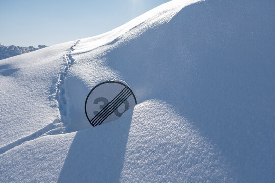 Naklejki road sign buried in snow