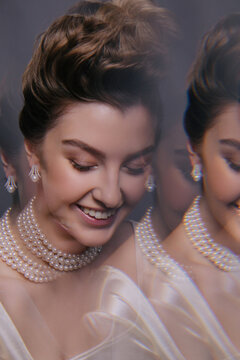 Double exposure portrait of smiling woman 