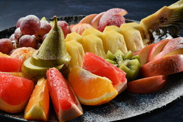 assorted fruits on a plate closeup