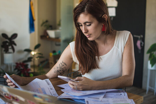 Checking bank statements and bills to pay