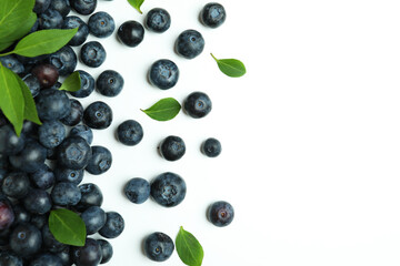 Fresh blueberry with leaves on white background