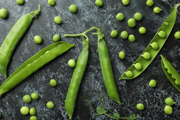 Fresh green pea on black smokey background