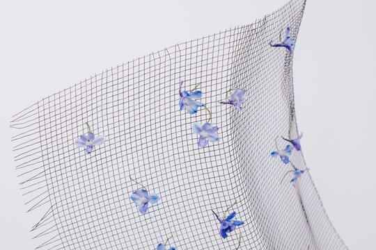 Blue flowers on mesh fabric
