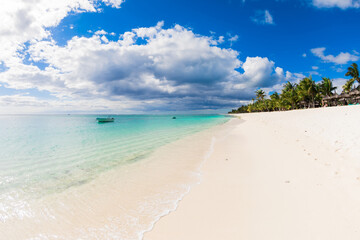 Tropical landscape - luxury beach with blue ocean, mountain and sky of Mauritius, Le Morne