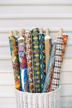 Rolls of African textile in a basket