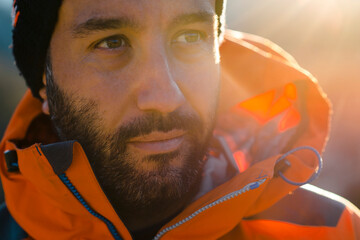 Traveling man in outerwear in nature 