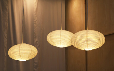 Pendant lamps for modern japanese style decoration installed on ceiling room.