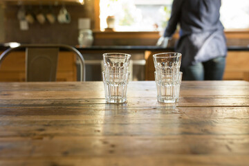 Clean stacked glasses on wooden table