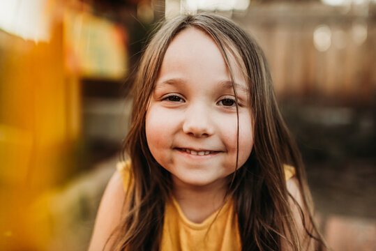 Young girl in backyard