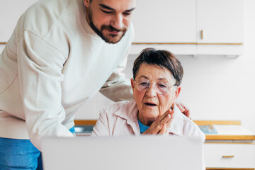 A Senior Lady and Her Grandson at Home