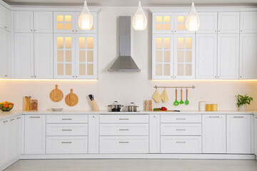 Modern kitchen interior with stylish white furniture