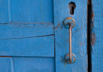 Vintage handle and lock.Blue Door