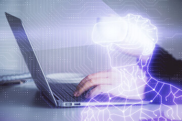 Double exposure of woman hands typing on computer and man in AR glasses drawing. Education concept.