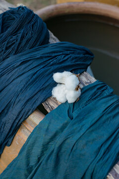 White fluffy cotton and indigo thread