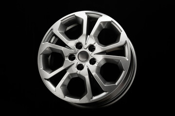 grey alloy wheels, stylish unusual design, dark background